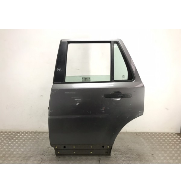 Дверь задняя левая бу для Land Rover Freelander 2 2.2 TD,  2010 г.